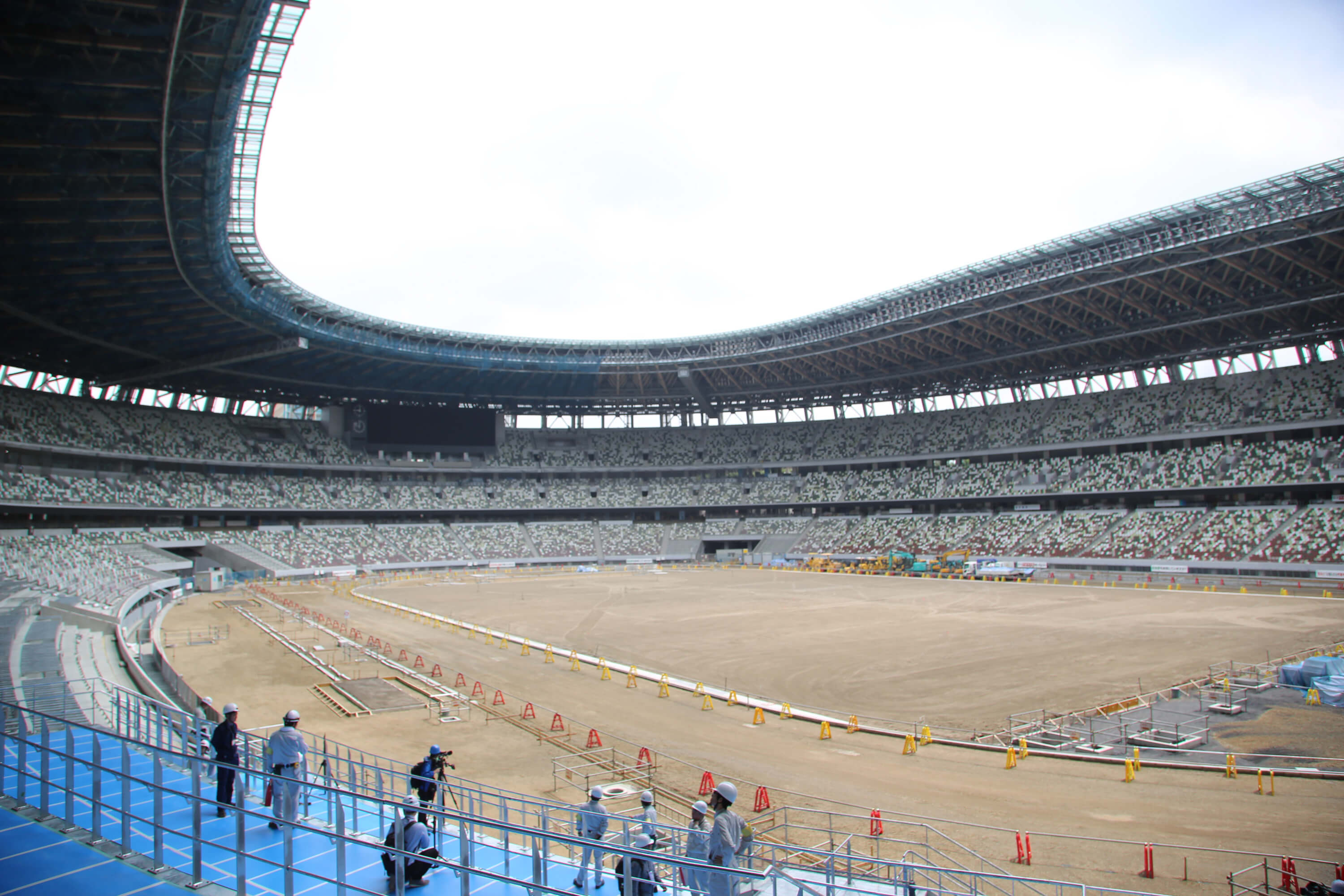 東奧主場館新國立競技場位於東京新宿，7月初完工約9成。東奧的開幕式、閉幕式、田徑賽將在這裡舉行，是3層樓建築，有6萬觀眾席，座位分5種顏色。（中央社檔案照片）